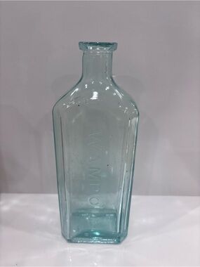 Vintage Wampole Aqua glass embossed medicine bottle c 1900-1925 pharmacy bottle